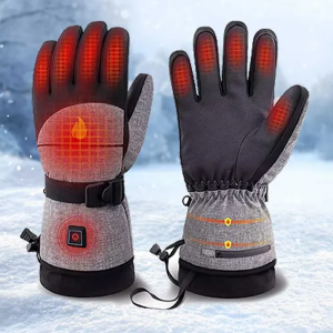 VolteX Heated Gloves on snowy background